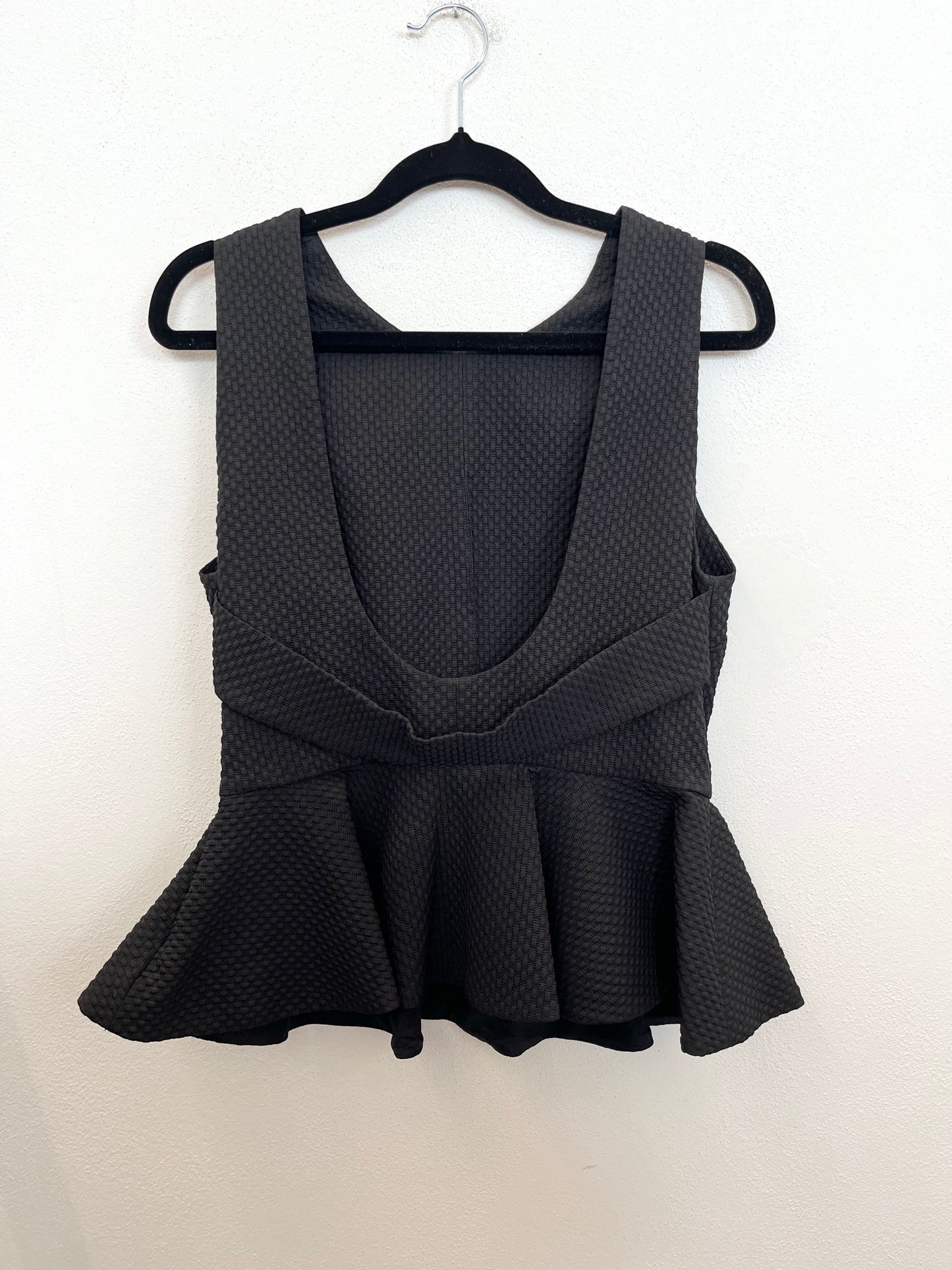 Top Hanita smanicato peplo con texture jacquard