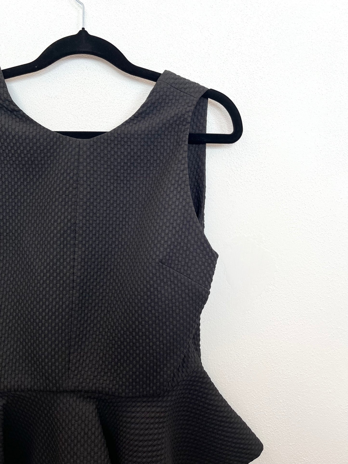 Top Hanita smanicato peplo con texture jacquard