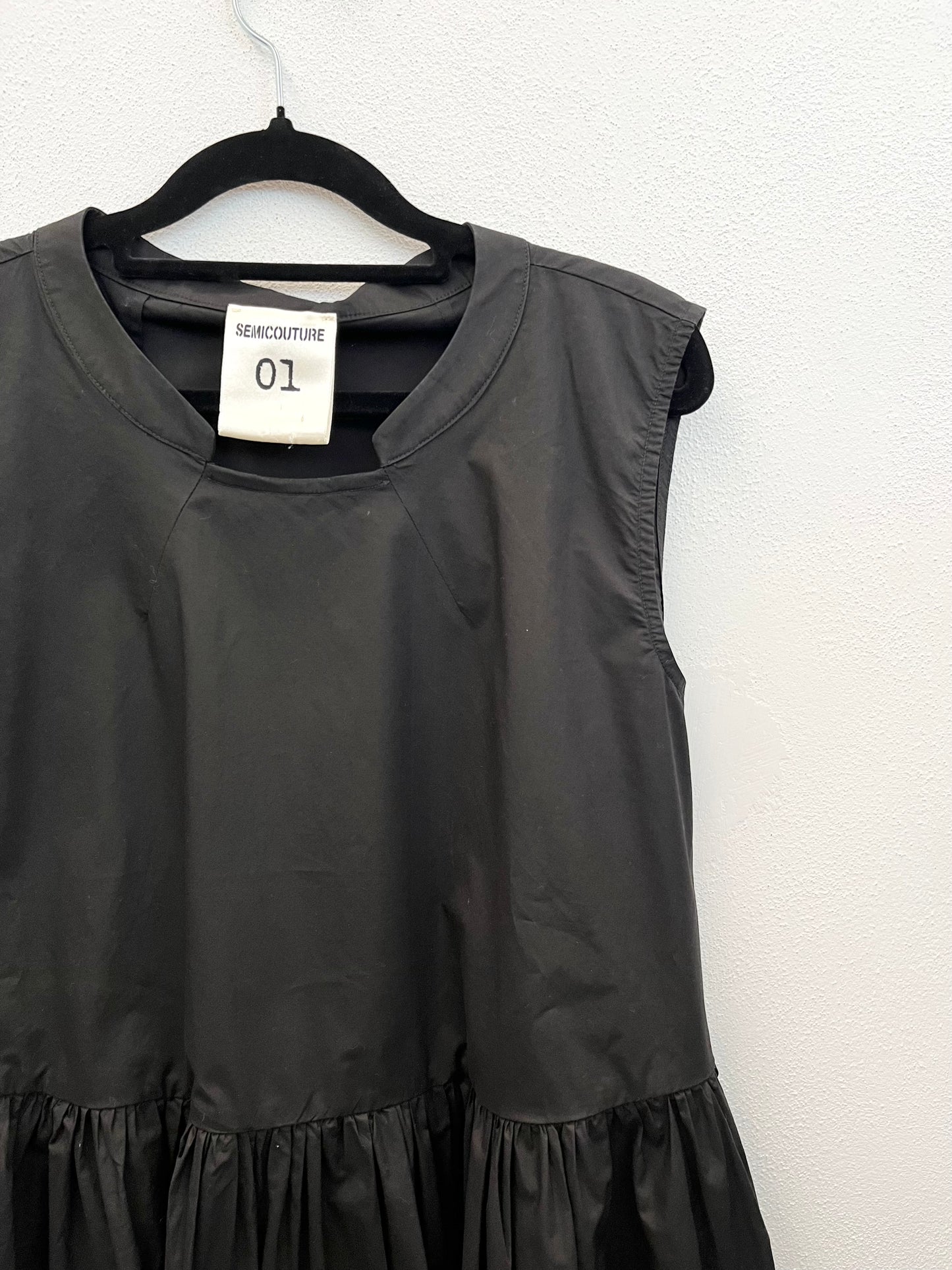 Blusa Semicouture smanicata con balza