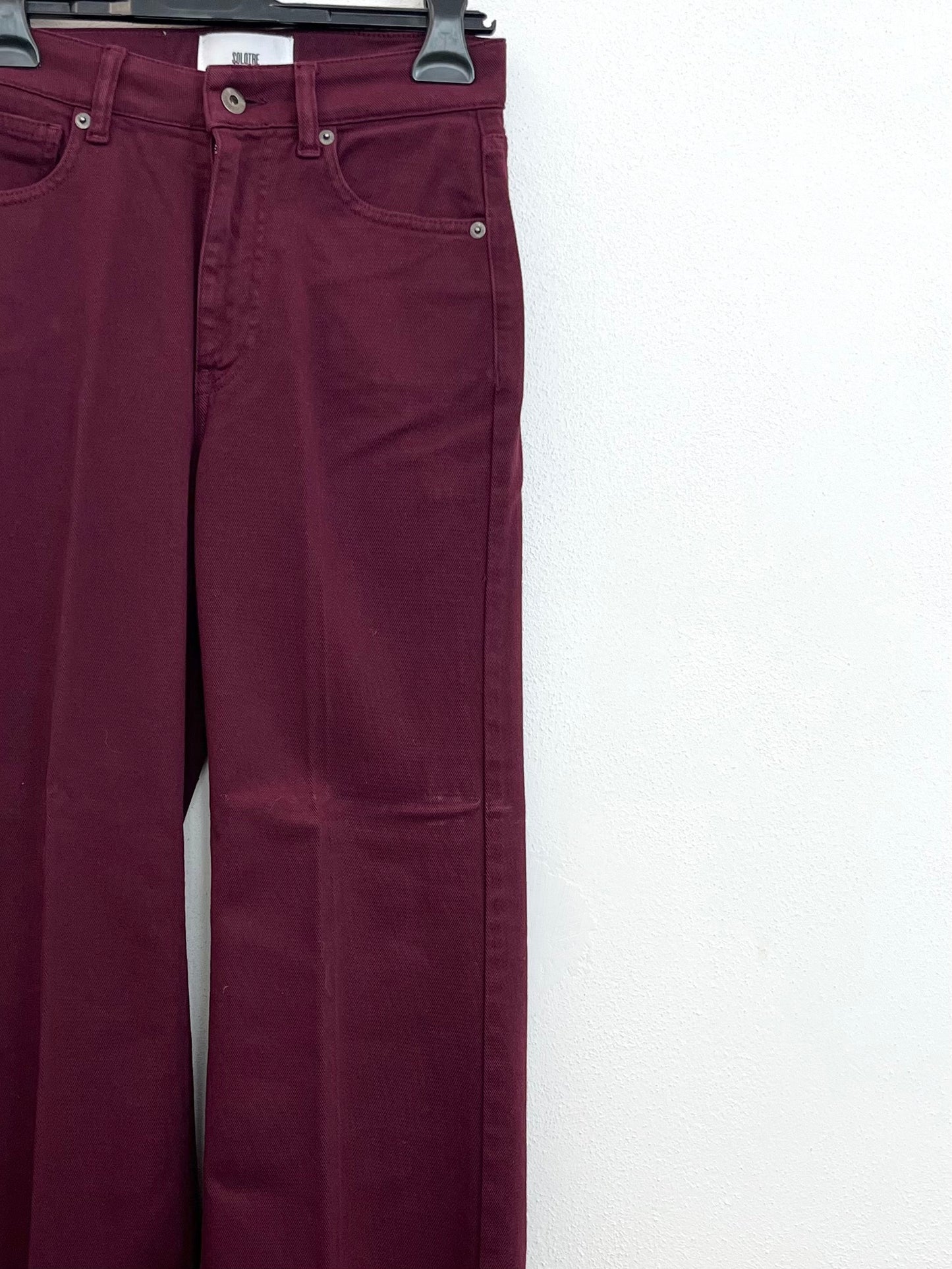 Jeans SoloTre a palazzo scuri con orlo sfrangiato