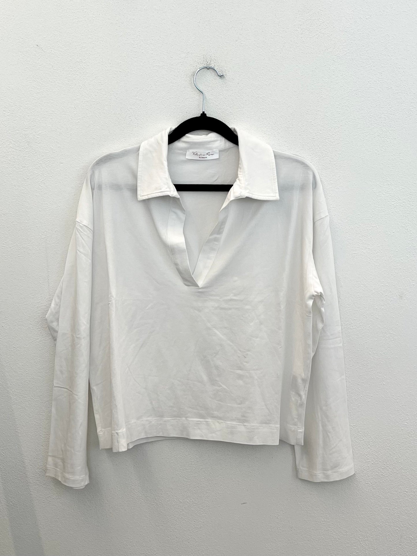 Blusa Valentino Rama liquida con scollo a polo profondo