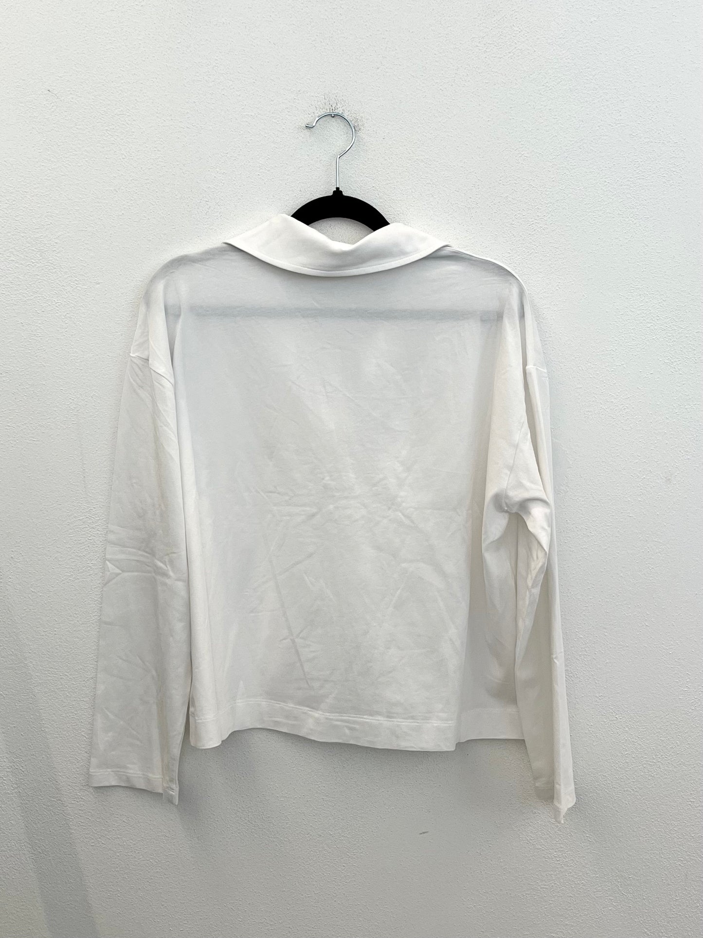 Blusa Valentino Rama liquida con scollo a polo profondo