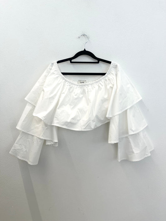 Top crop Dixie con scollo Bardot e maxi volants