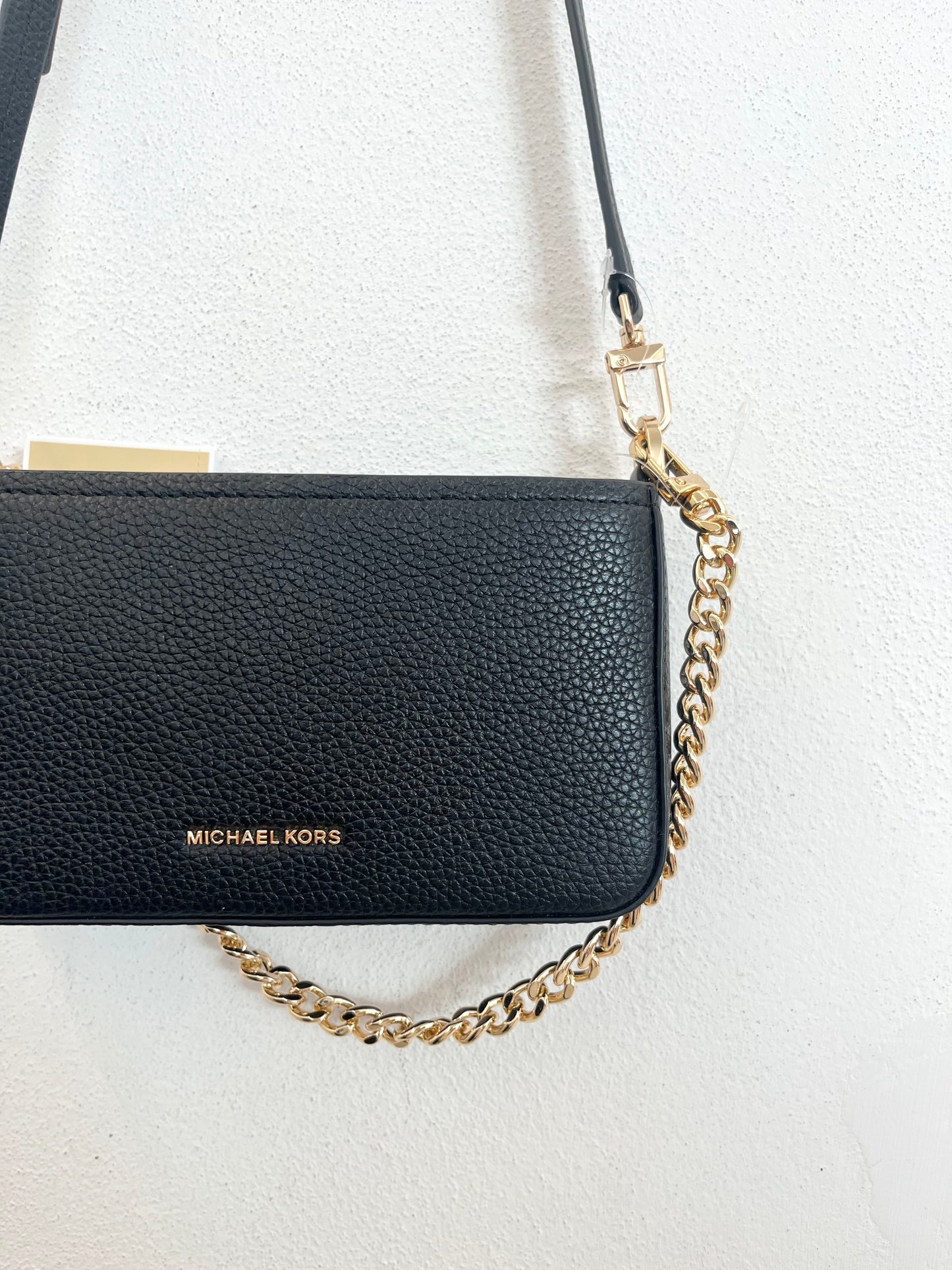 Borsa crossbody Michael Kors in pelle martellata con catena