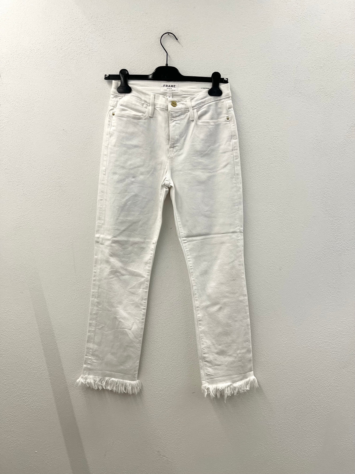 Jeans bianchi Frame Le High Straight con fondo sfrangiato