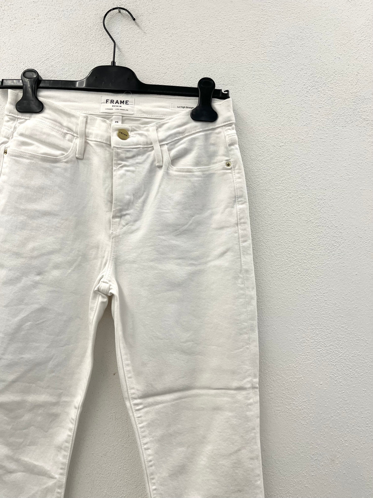 Jeans bianchi Frame Le High Straight con fondo sfrangiato