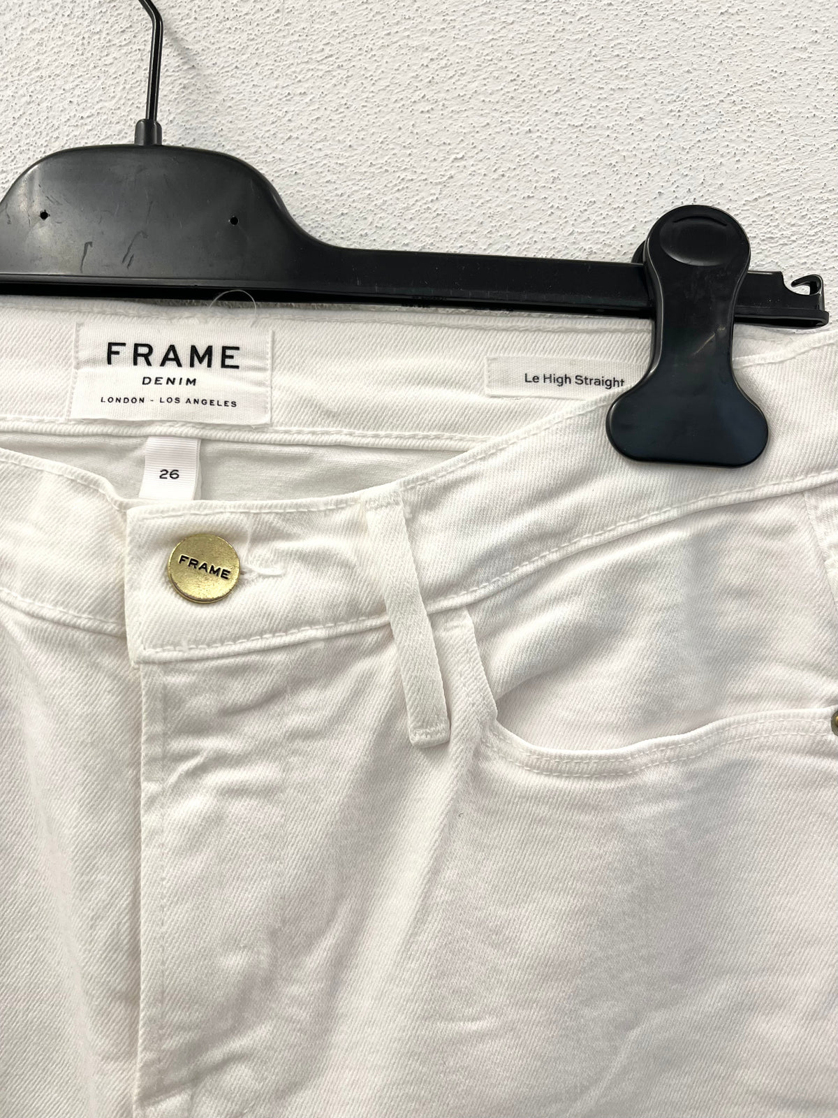 Jeans bianchi Frame Le High Straight con fondo sfrangiato