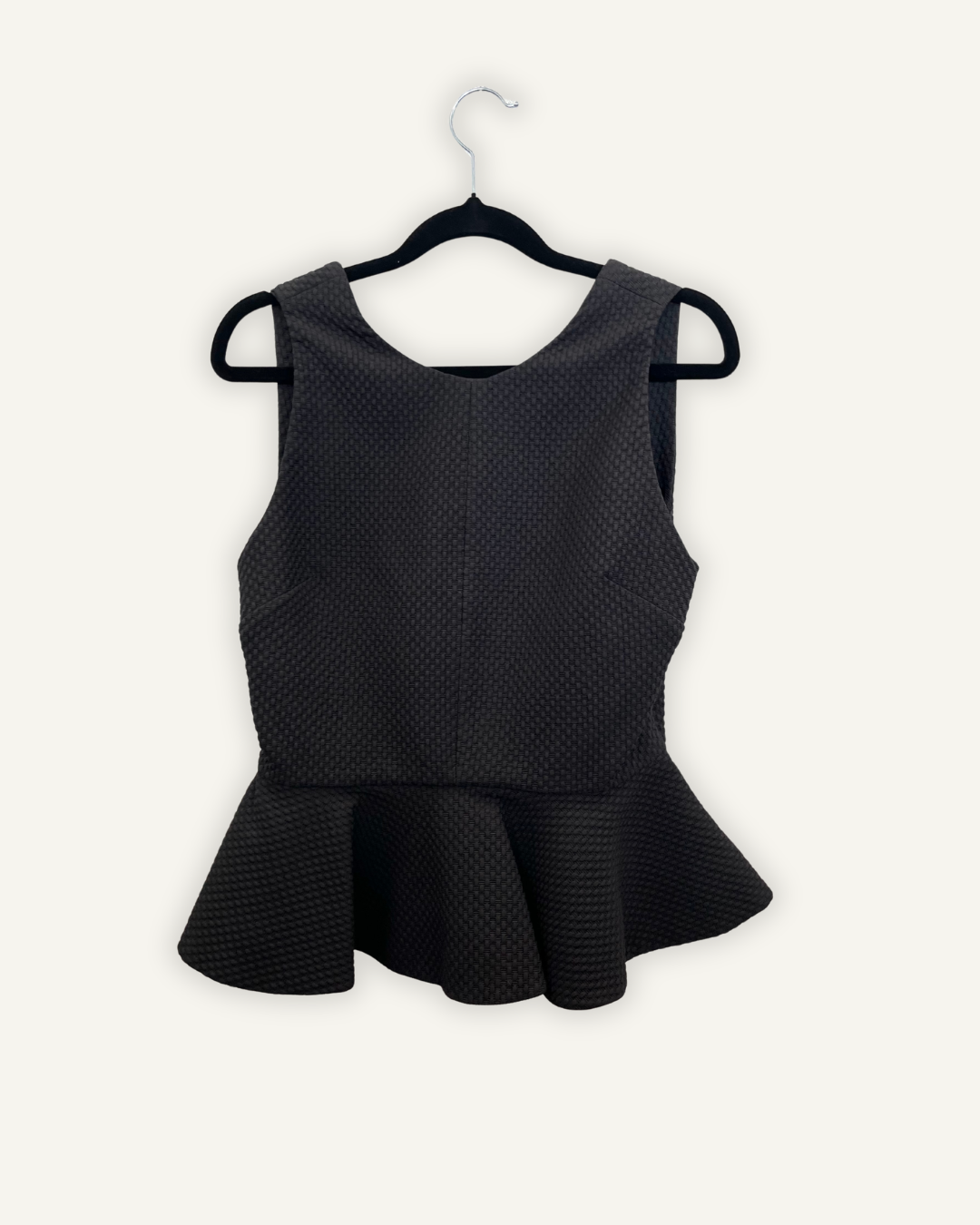 Top Hanita smanicato peplo con texture jacquard