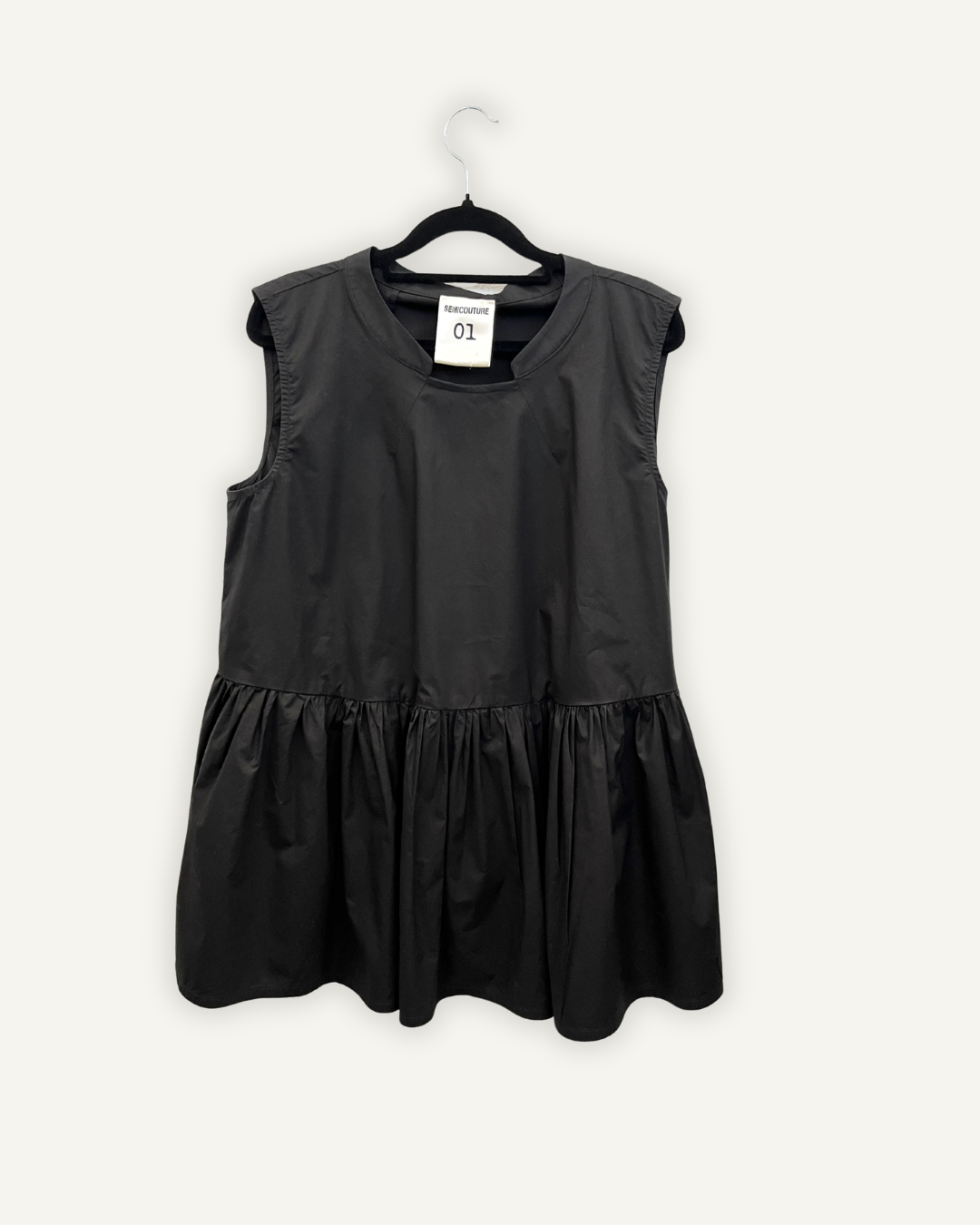 Blusa Semicouture smanicata con balza